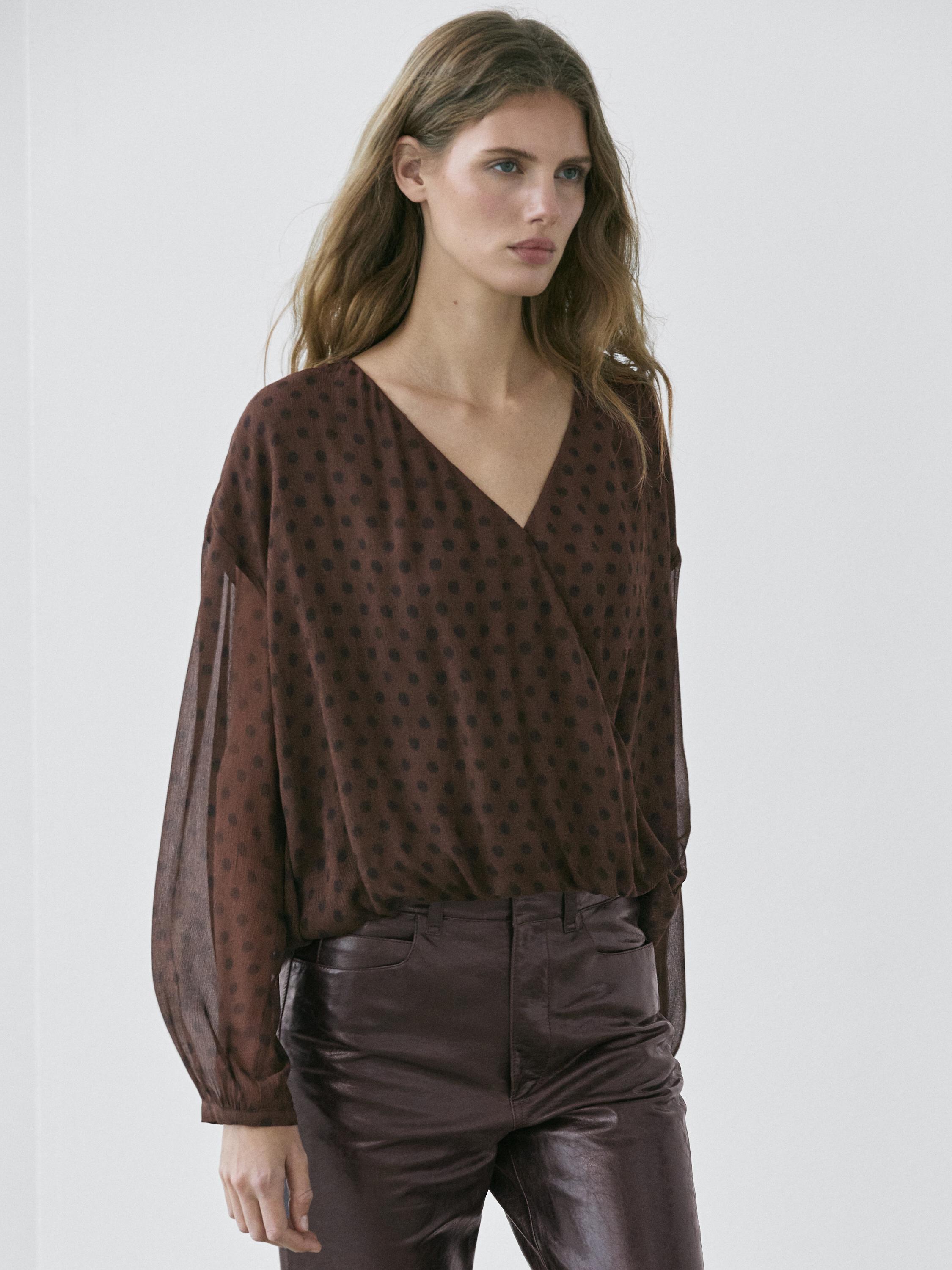 Flowing surplice polka dot blouse